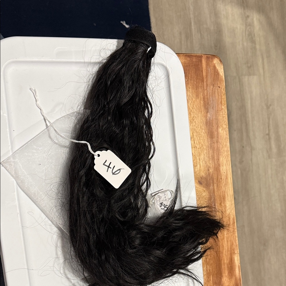 # 46 - Luxurious Black Wavy Human Hair Extension Velcro closure